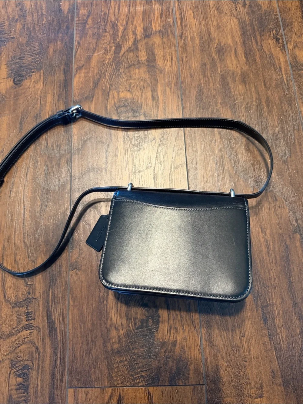 Coach sleek black